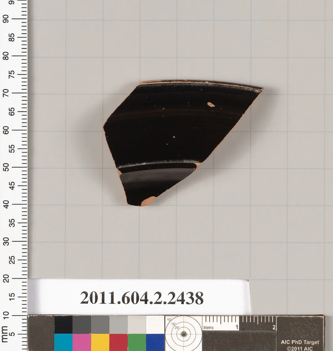 Terracotta rim fragment from a plate — Unknown