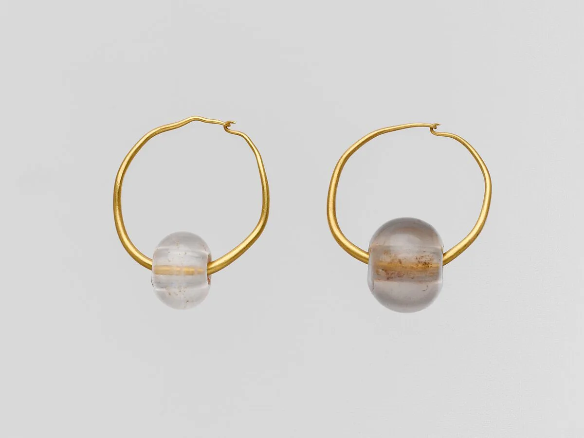 Gold earring with rock crystal bead — Unknown