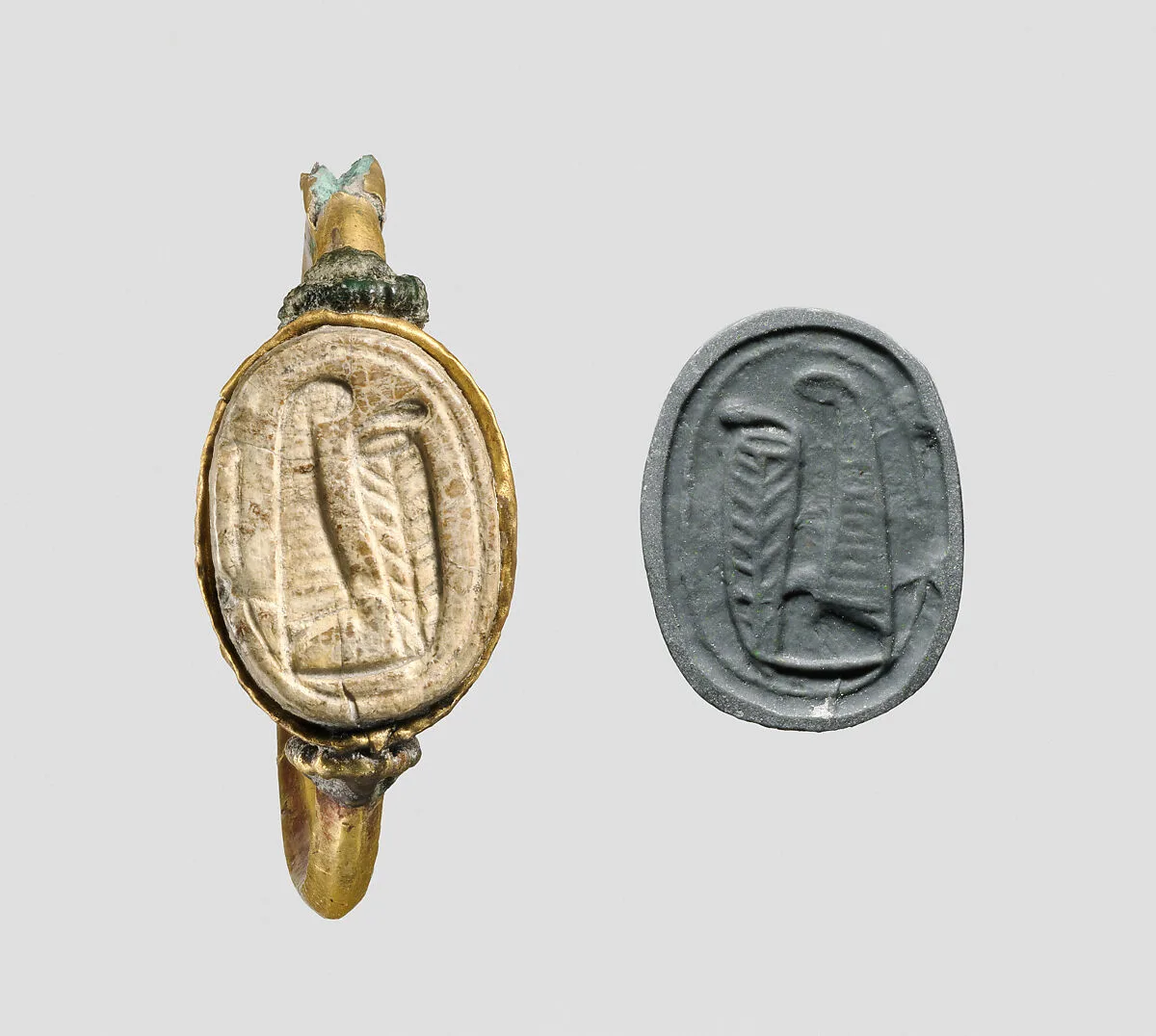 Gold ring with glass scarab — Unknown