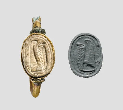Gold ring with glass scarab