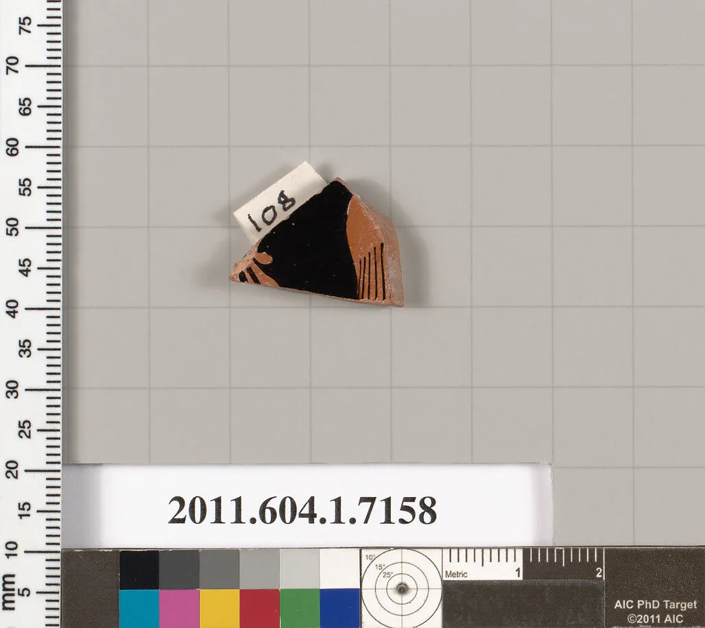 Terracotta fragment of a kylix (drinking cup) — Makron