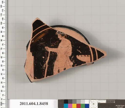 Terracotta fragment of a stemless kylix (drinking cup)