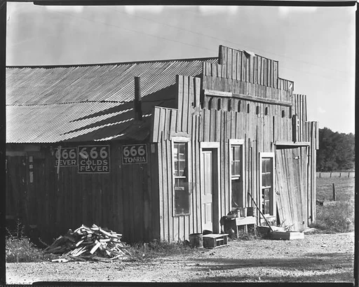 [Wooden Farm Building with Ads for 666 Cold Remedy on Façade, Tennessee]