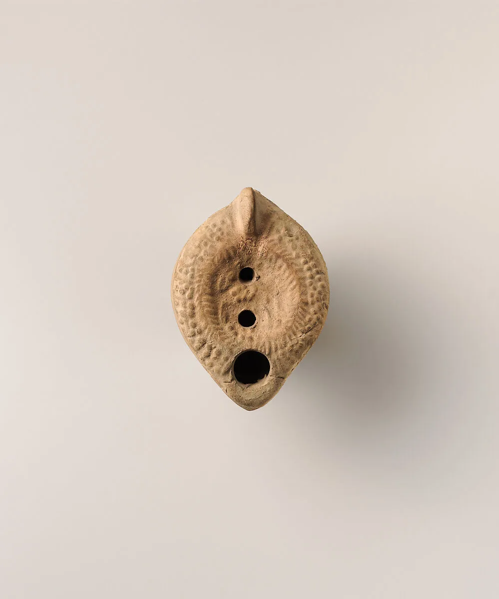 Terracotta oil lamp — Unknown