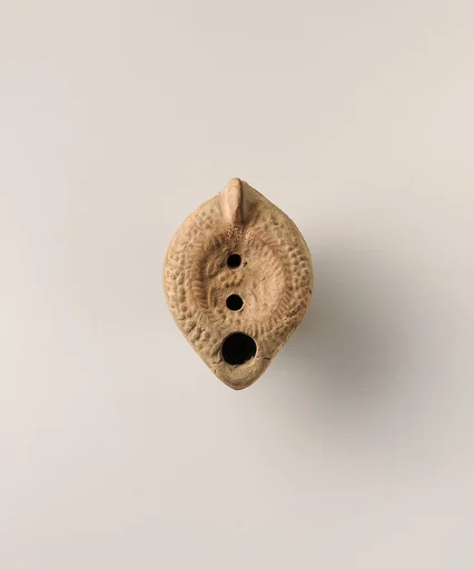 Terracotta oil lamp