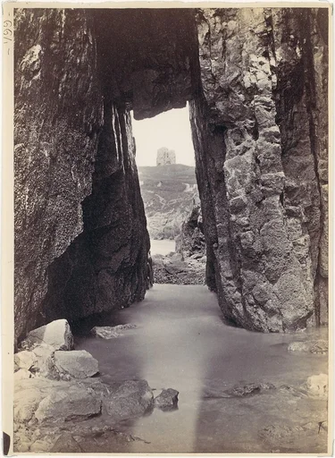 [View Through Rocks' Of Tower On Hill]