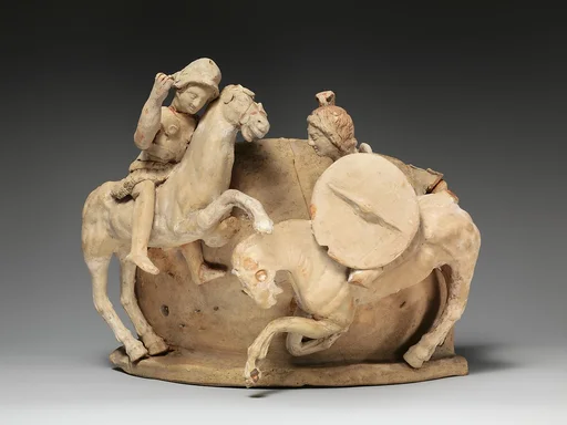 Terracotta relief probably from a funnel vase