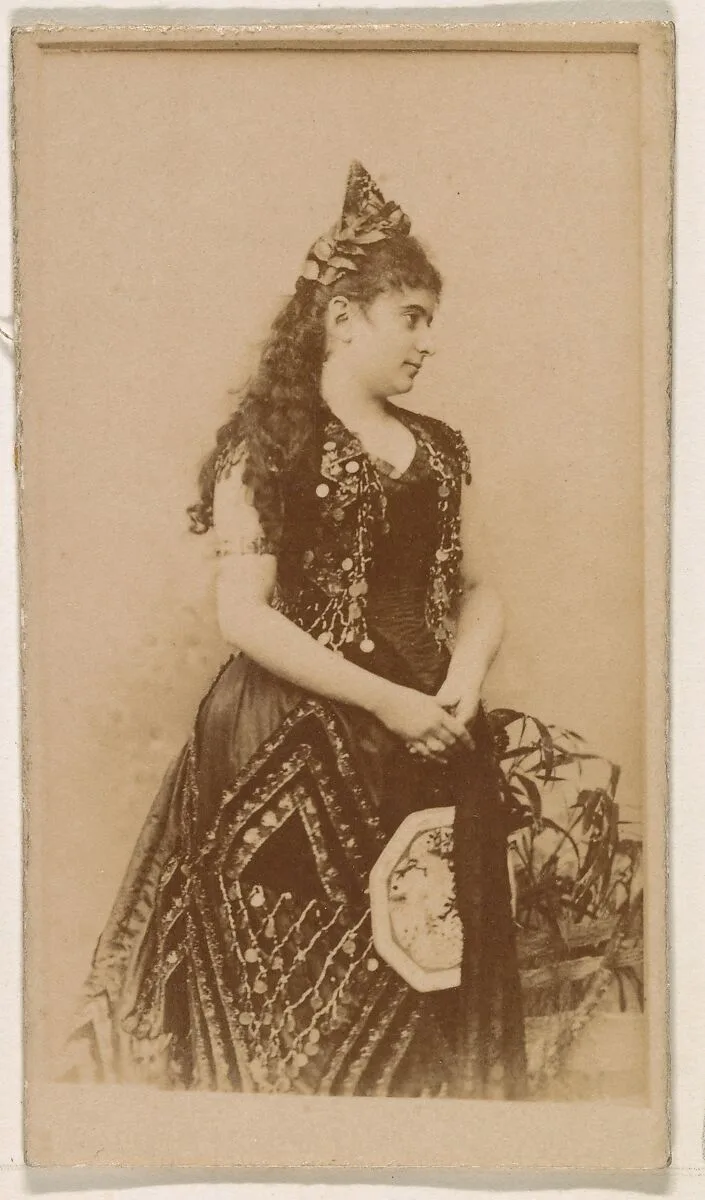 Actress in long dark gown, from the Actresses series (N245) issued by Kinney Brothers to promote Sweet Caporal Cigarettes — Kinney Brothers Tobacco Company