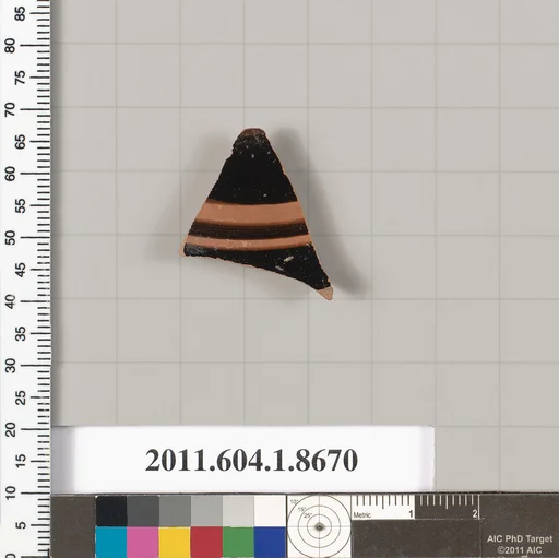 Terracotta fragment of a stemless kylix (drinking cup)