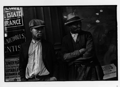 [Two 35mm Film Frames: Two Men on Street]