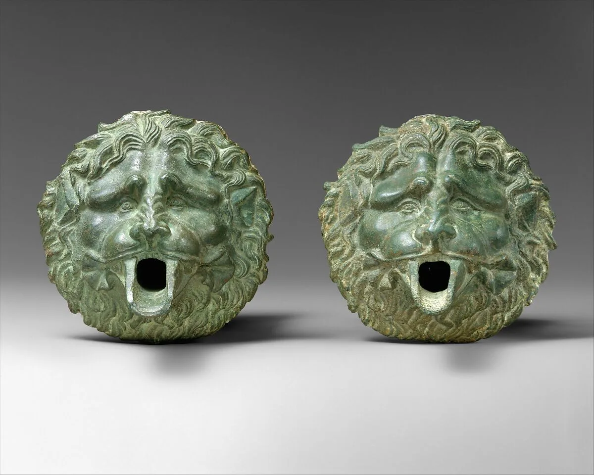 Bronze water spout in the form of a lion mask (one of a pair) — Unknown