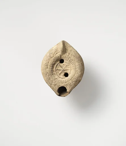 Terracotta oil lamp