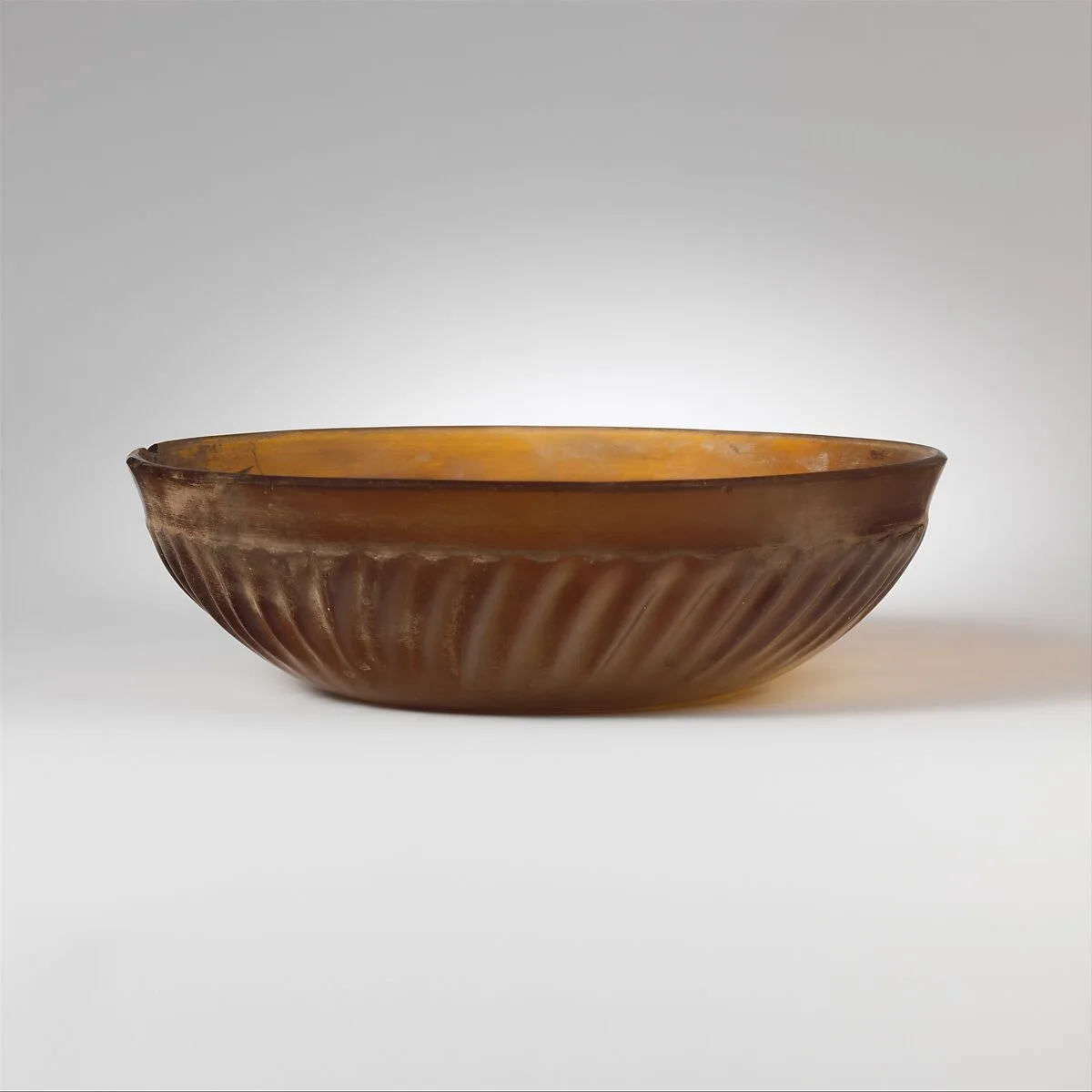 Glass ribbed bowl — Unknown