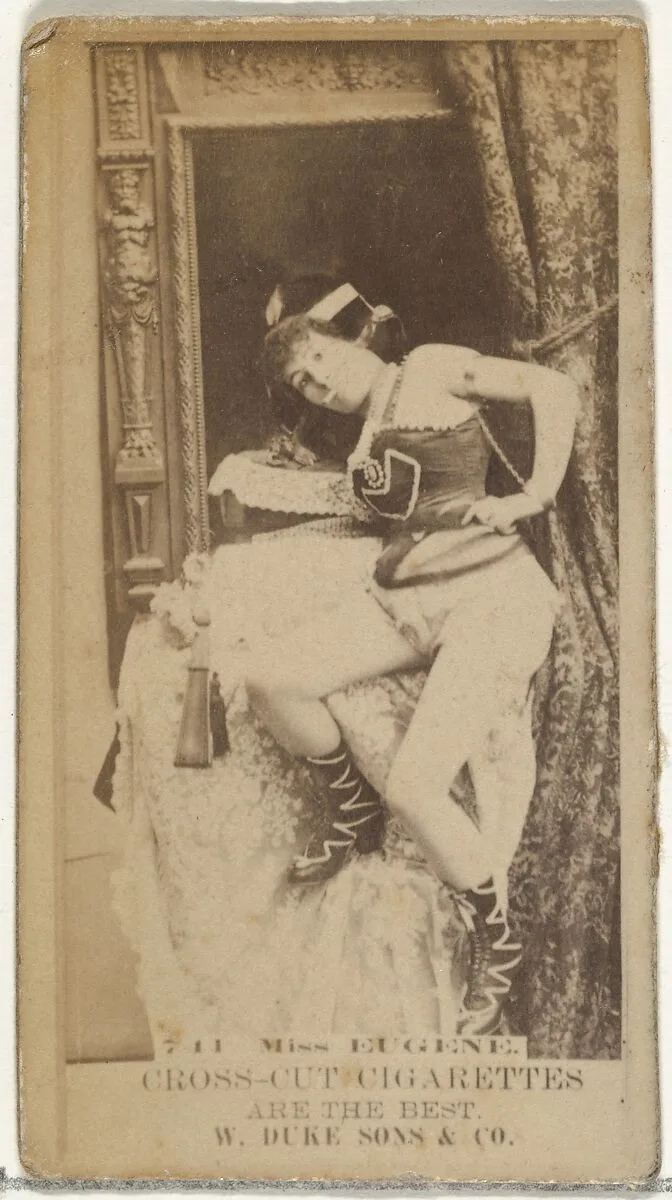 Card Number 711, Miss Eugene, from the Actors and Actresses series (N145-3) issued by Duke Sons & Co. to promote Cross Cut Cigarettes — W. Duke, Sons & Co.