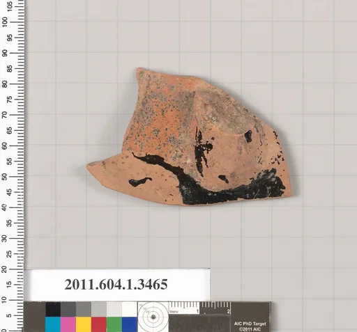 Terracotta fragment of a kylix (drinking cup)