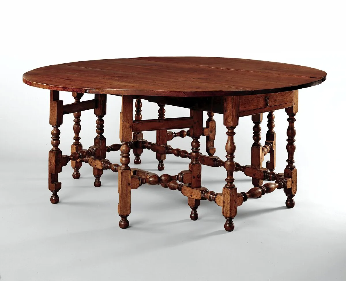 Oval table with falling leaves — Unknown