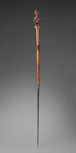 Staff : Finial with Kneeling Female Figure