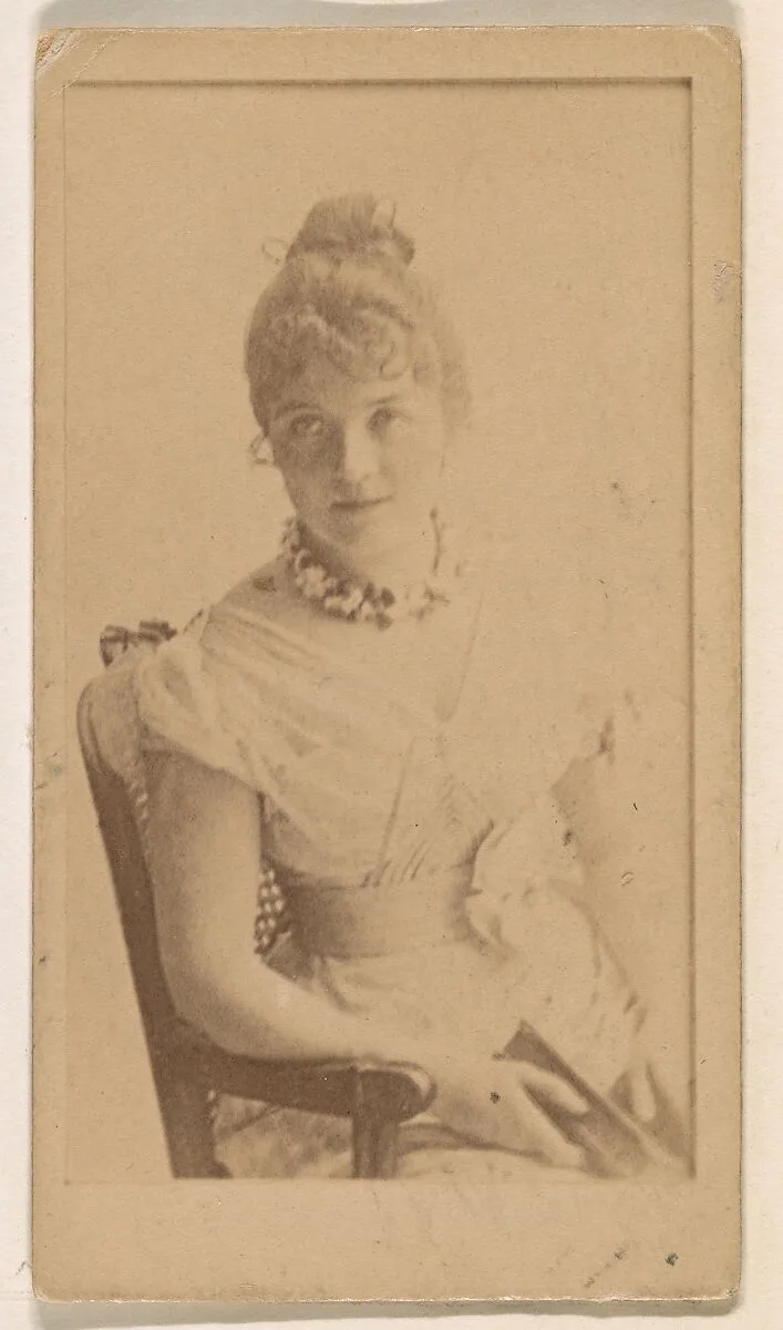 Seated actress, from the Actresses series (N245) issued by Kinney Brothers to promote Sweet Caporal Cigarettes — Kinney Brothers Tobacco Company