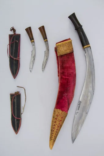 Knife (Kukri) with Two Sheaths, Two Small Knives, and Two Sharpening Pouches