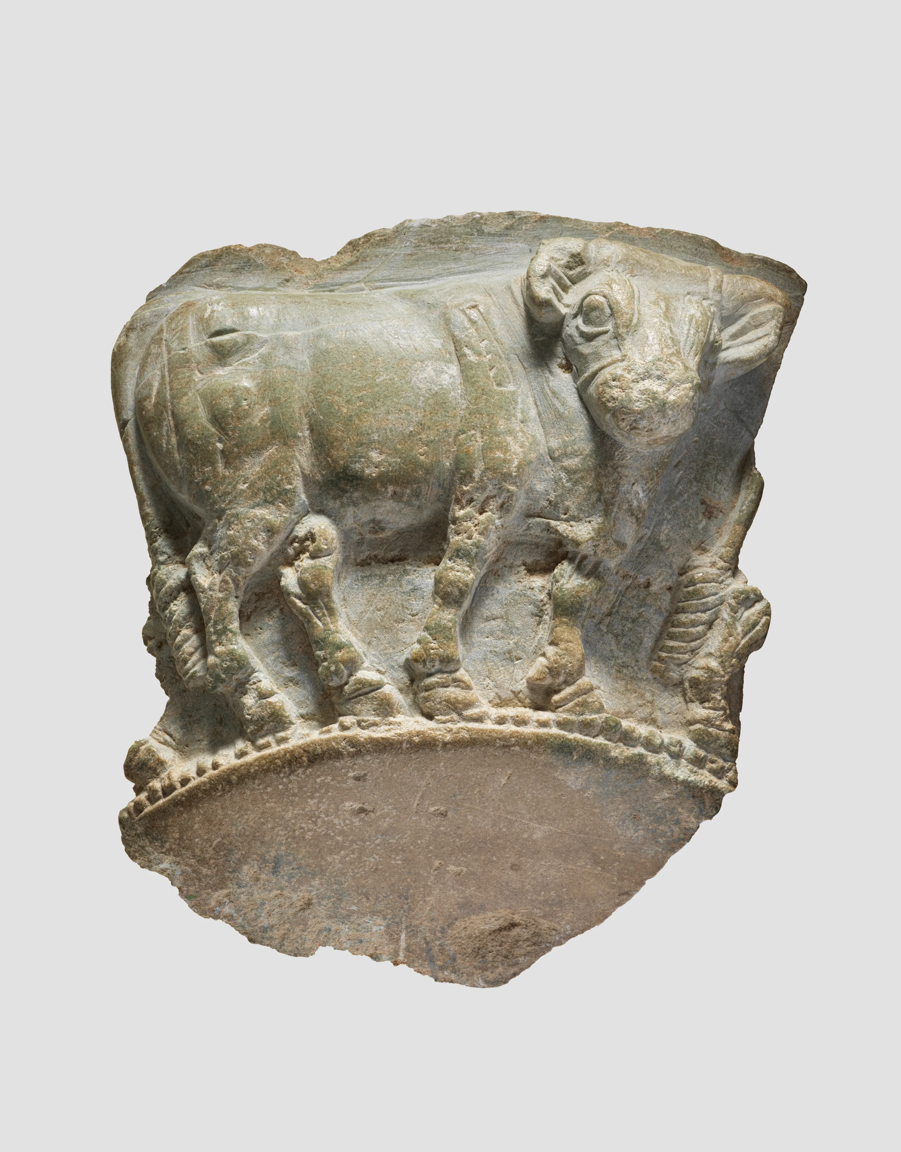 Fragment of a bowl with a frieze of bulls in relief — Unknown