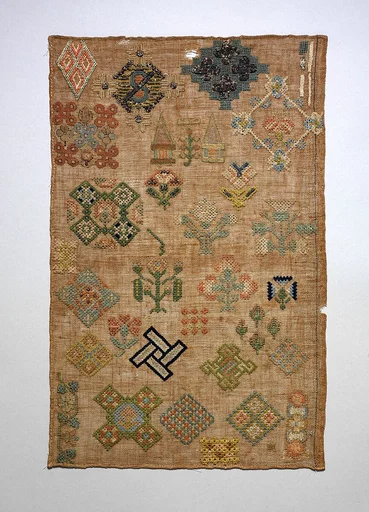 Embroidered spot sampler