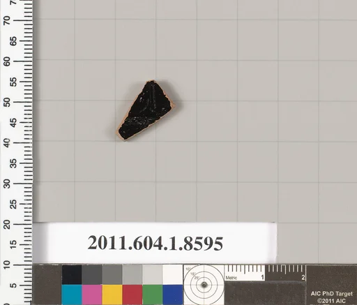 Terracotta fragment of a stemless kylix (drinking cup)
