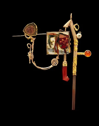 "Homage to Cy Twombly and Joseph Cornell" Brooch in book