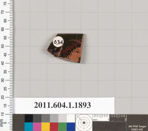 Terracotta rim fragment of a kylix (drinking cup)