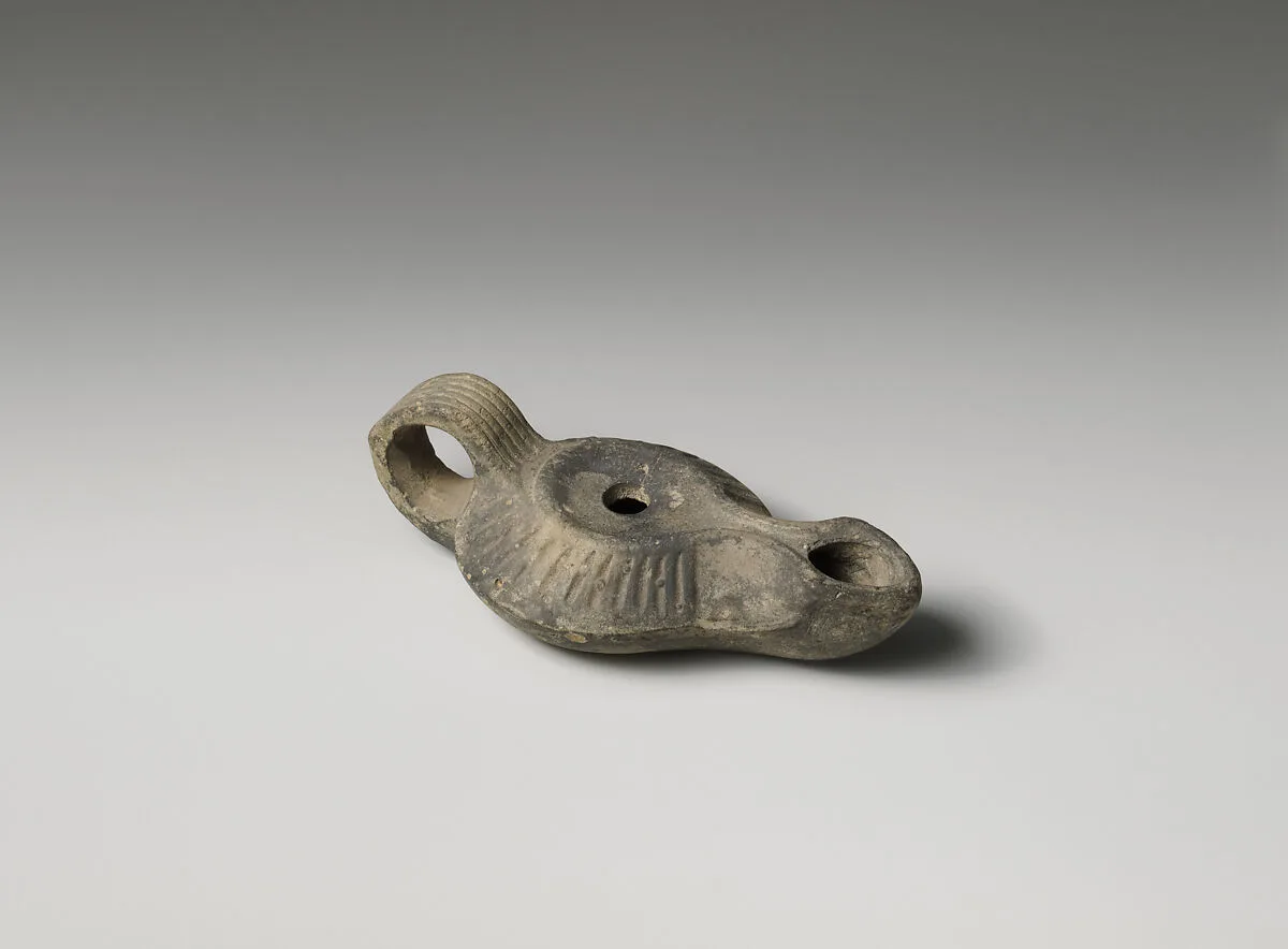 Terracotta oil lamp — Unknown