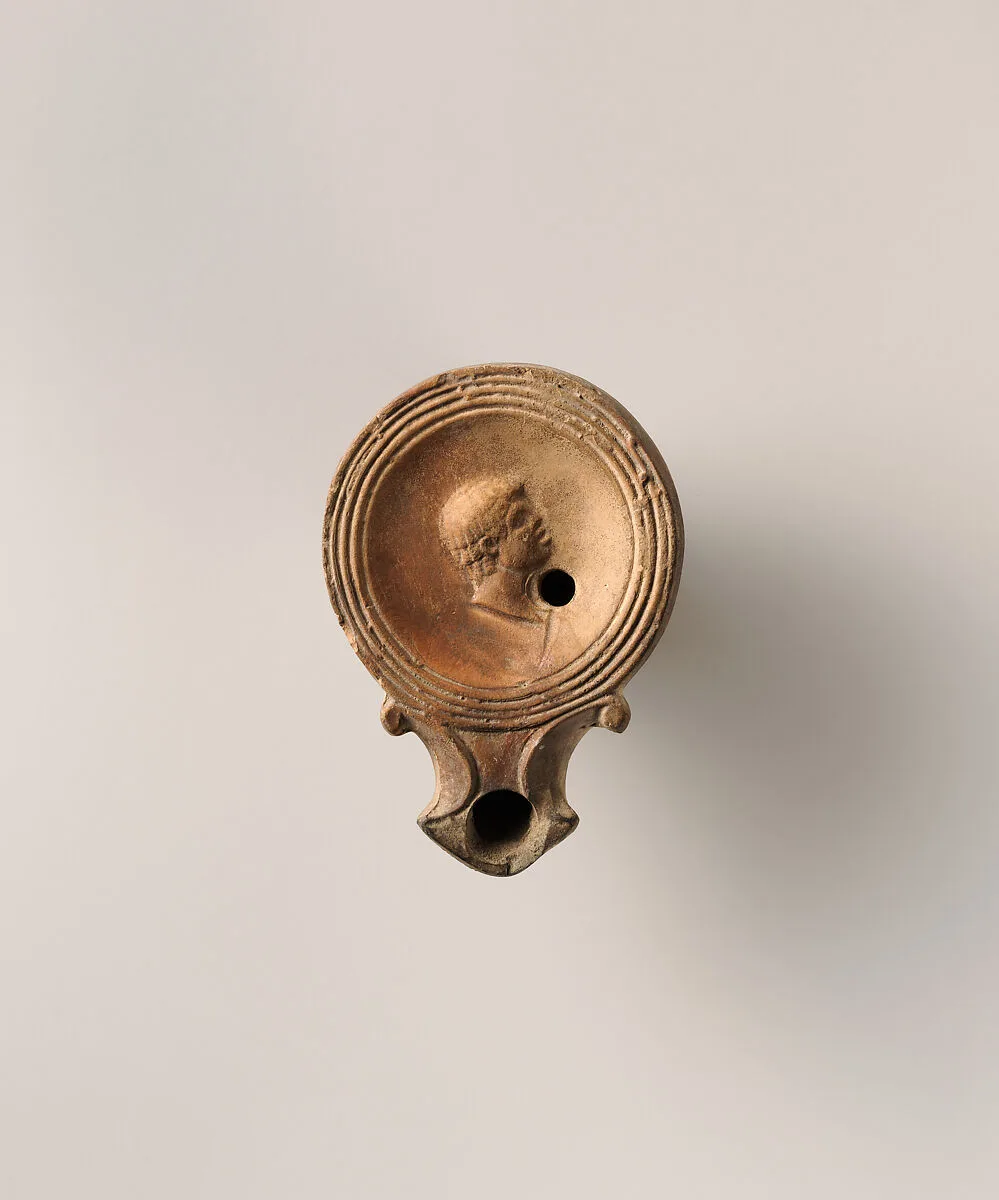 Terracotta oil lamp — Unknown