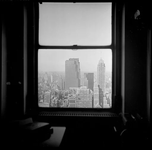 [3 Views of Window with View of New York City Skyline]