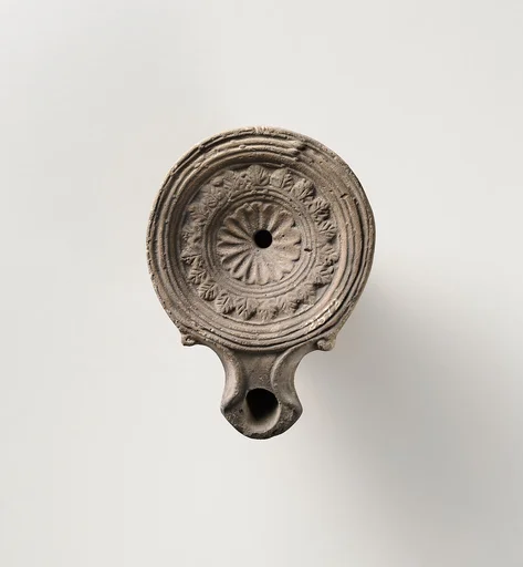 Terracotta oil lamp