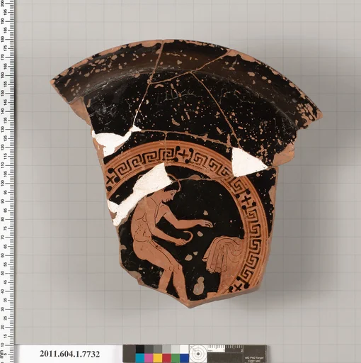 Terracotta fragment of a kylix (drinking cup)