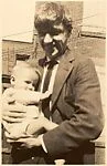 [Walker Evans Holding Anita Skolle, Child of Hanns and Lily Skolle, 13 East 14th Street,  New York City]