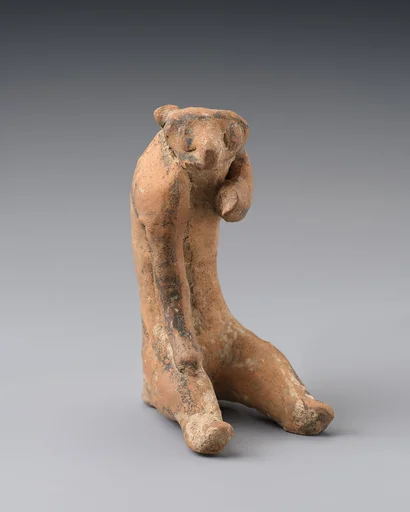 Terracotta statuette of a monkey or bear