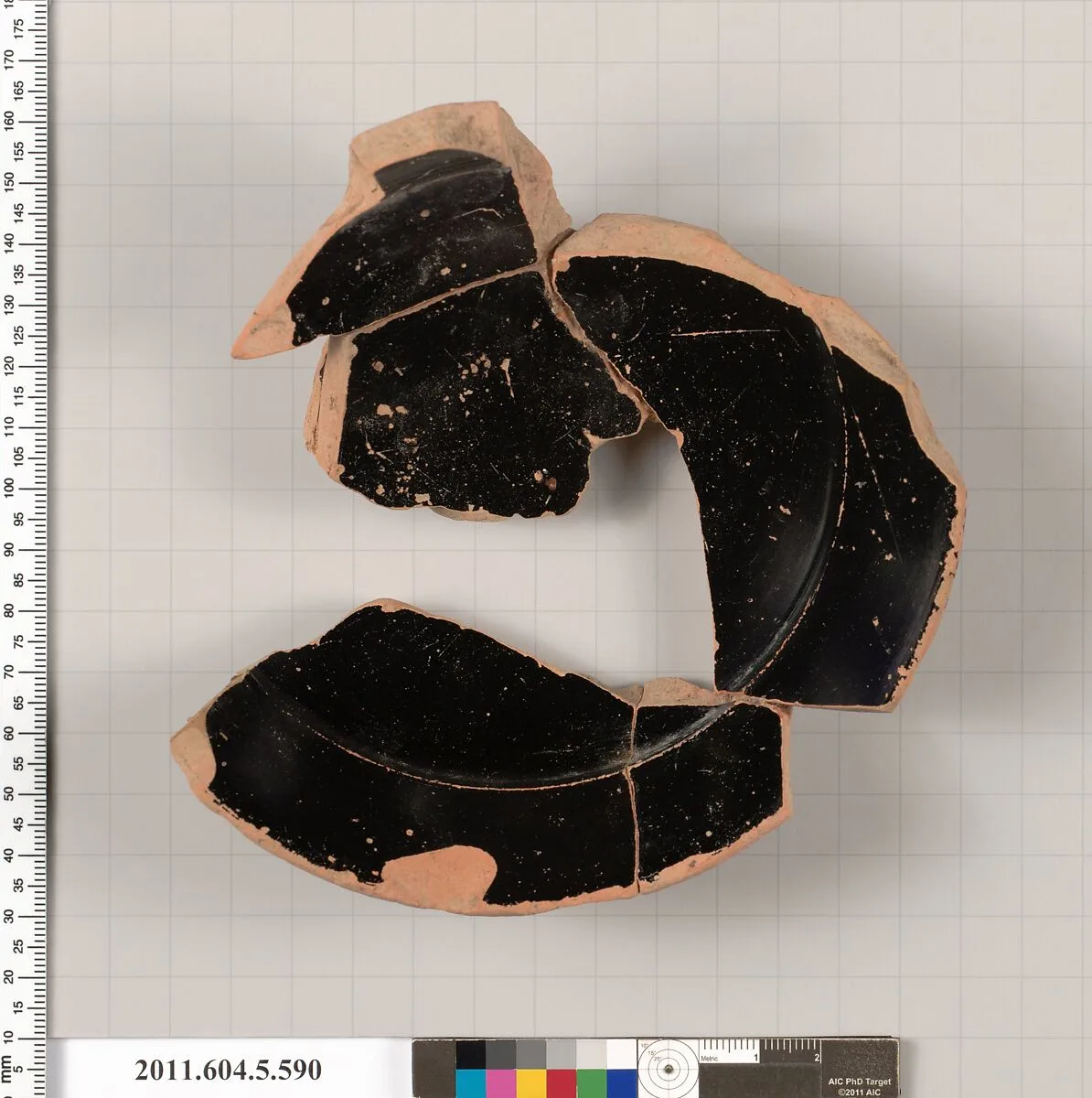 Terracotta fragment of a stemless kylix (drinking cup) — Unknown