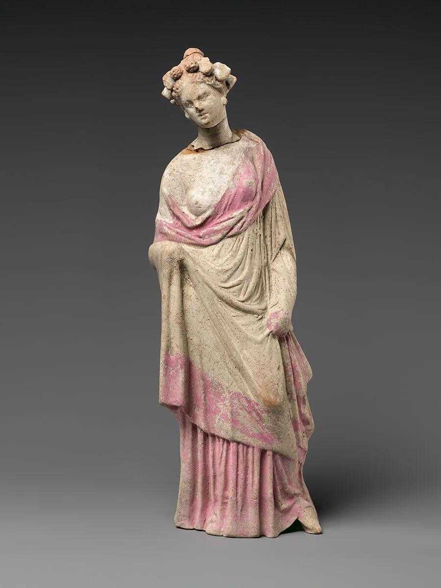Terracotta statuette of a woman — Unknown