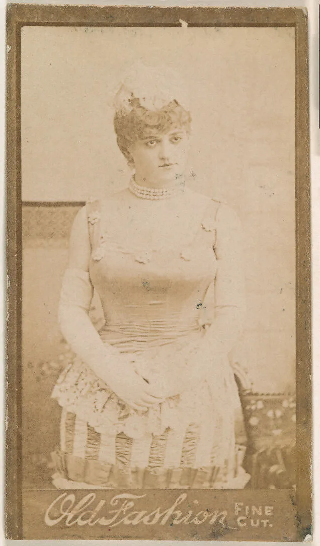 Actress standing with hands clasped at waist, from the Actresses series (N664) promoting Old Fashion Fine Cut Tobacco — Unknown