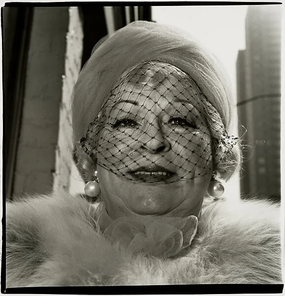 Woman with a veil on Fifth Avenue, N.Y.C. — Diane Arbus