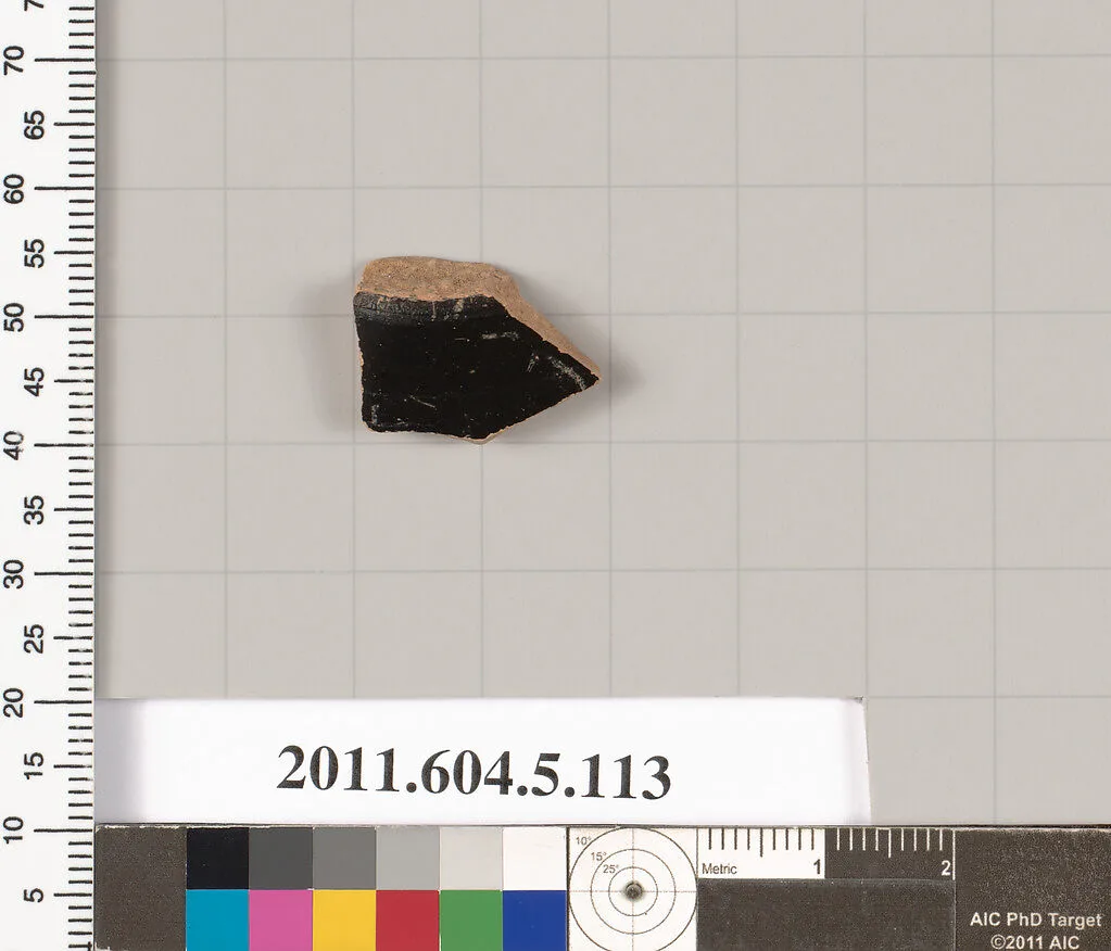 Terracotta fragment of a stemless kylix (drinking cup)? — Unknown