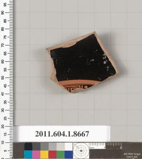 Terracotta fragment of a stemless kylix (drinking cup)