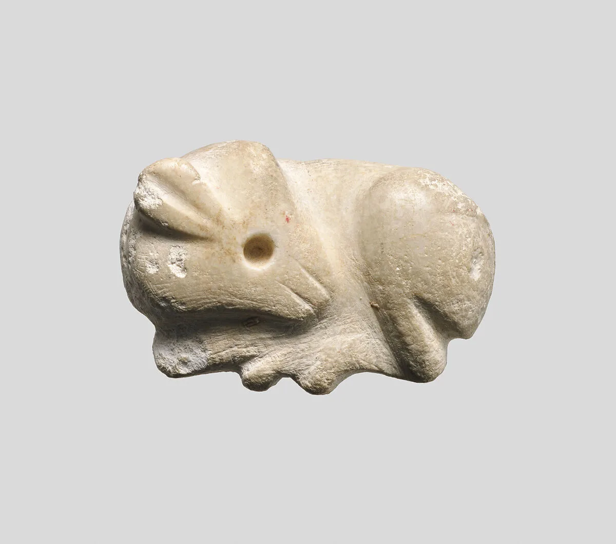 Seal amulet in the form of a reclining cow — Unknown