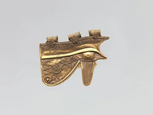Wedjat eye with granulation and decorative wire ornament