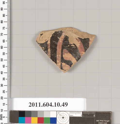 Terracotta fragment of a kylix (drinking cup)
