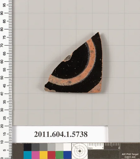 Terracotta fragment of a kylix: eye-cup (drinking cup)