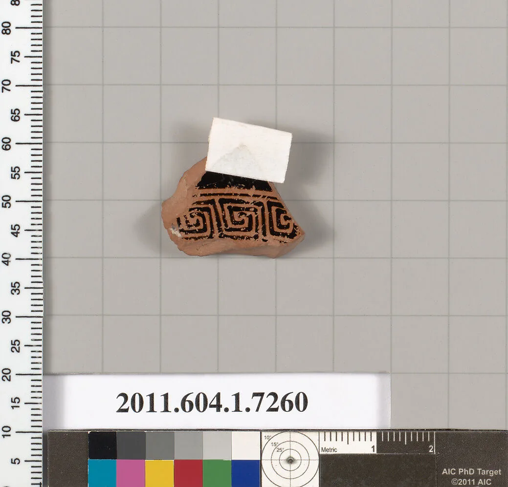 Terracotta fragment of a kylix (drinking cup) — Makron