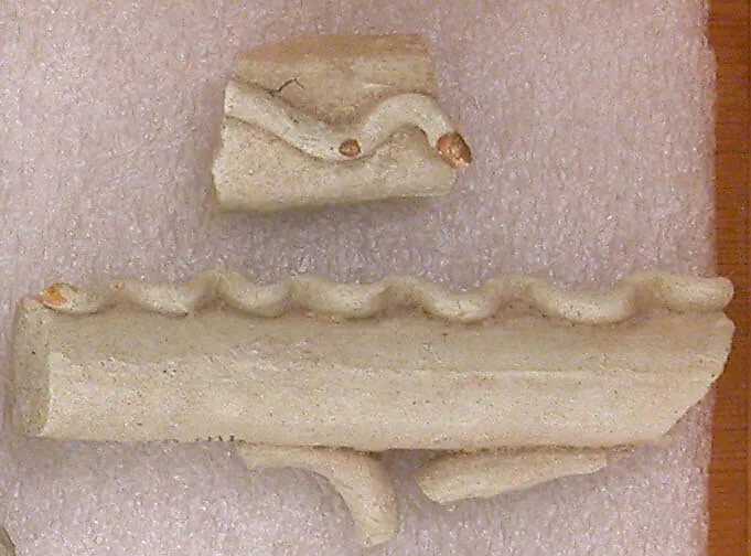Fragment of a Handle with Wavy Band — Unknown