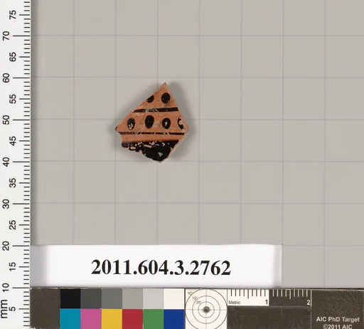 Terracotta fragment of an oinochoe: chous (jug)?