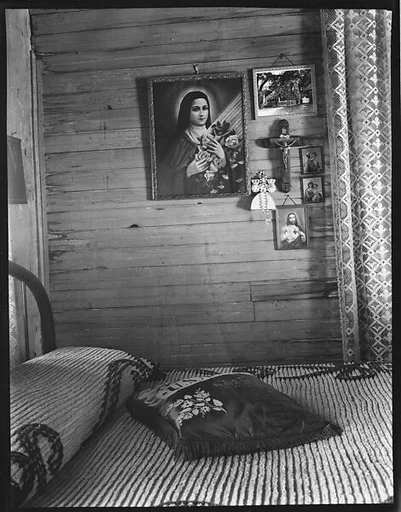 [Bedroom Interior with Religious Pictures on Wall, Shrimp Fisherman's House, Biloxi, Mississippi]