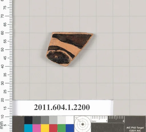 Terracotta rim fragment of a kylix (drinking cup)